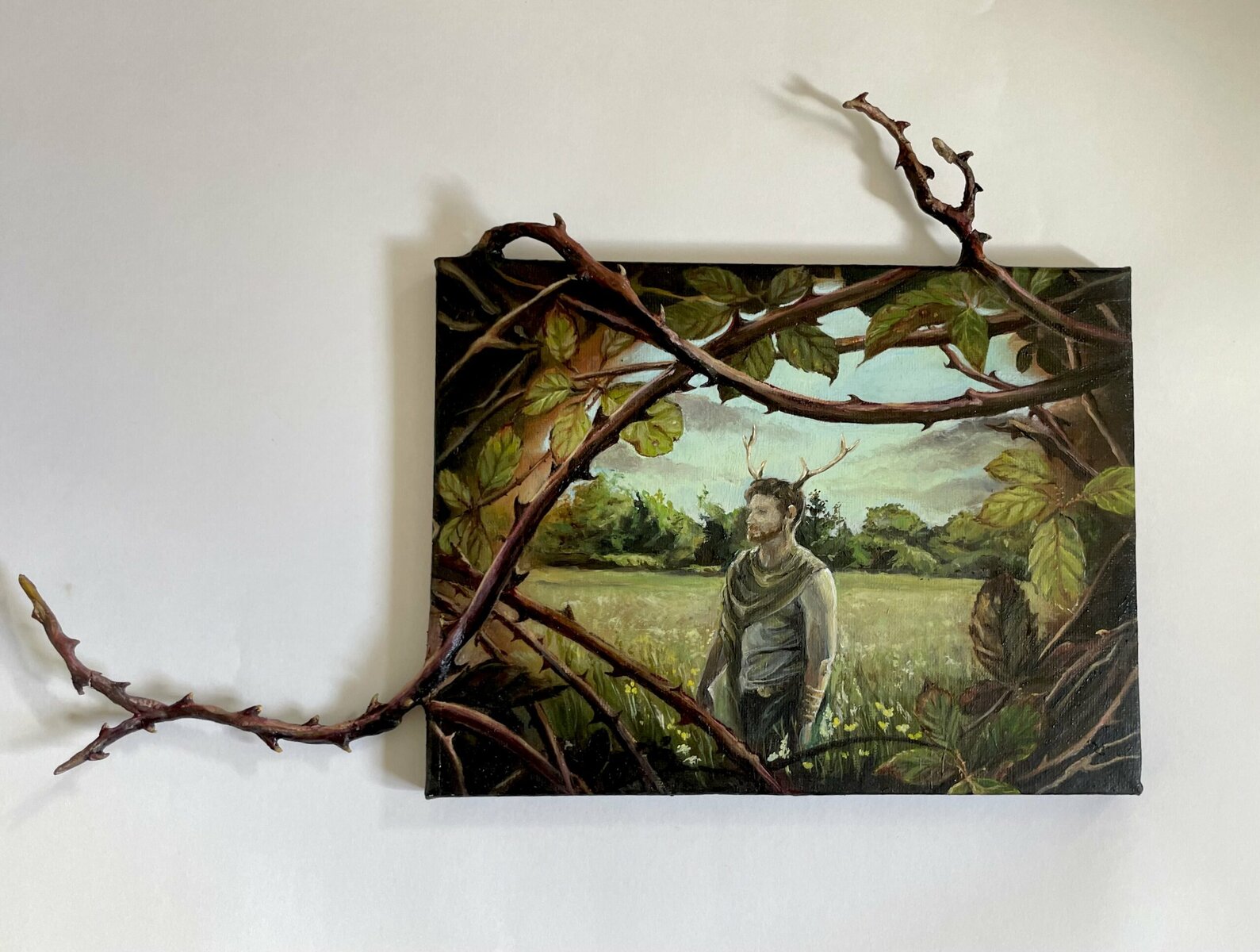 painting of man in a field