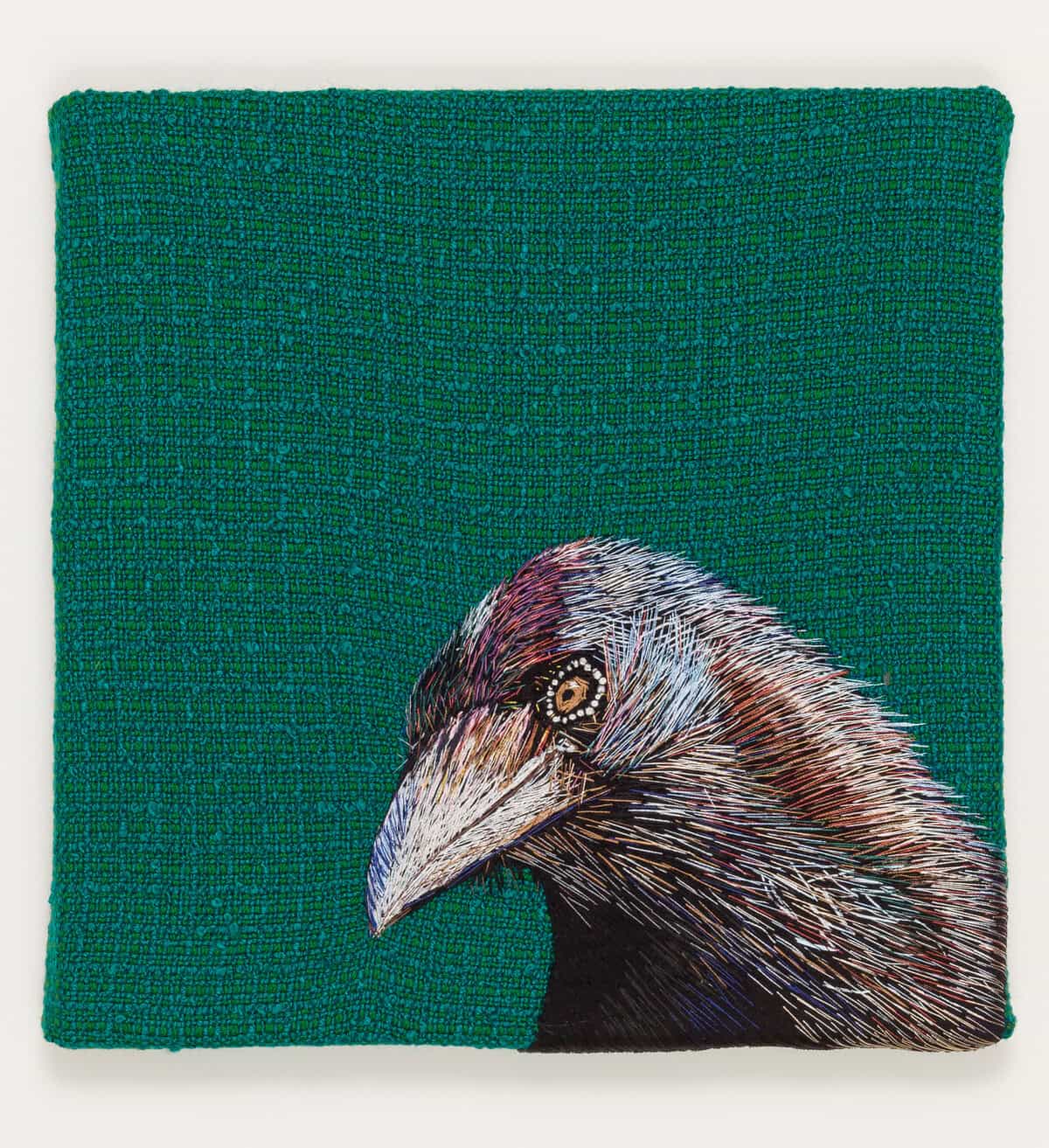 Material art piece depicting crow