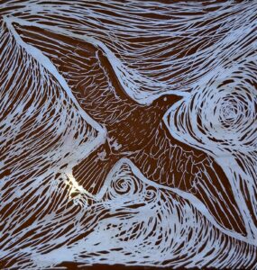 Bird in flight etching in stained glass