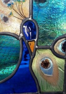 Peacock in stained gass