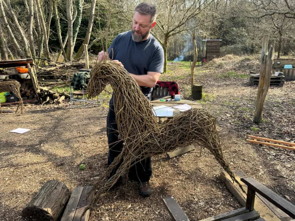 willow sculpture of a horse by Phil mc Sweeny